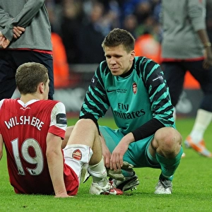 Dejected Arsenal players Wojciech Szczesny and Jack Wilshere. Arsenal 1: 2 Birmingham City