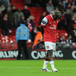 Dejected Bacary Sagna (Arsenal). Arsenal 1: 2 Birmingham City, Carling Cup Final