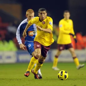 Denilson (Arsenal) Ben Watson (Wigan). Wigan Athletic 2: 2 Arsenal, DW Stadium