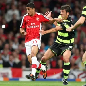 Denilson (Arsenal) Massimo Donati (Celtic) Denilson (Arsenal) Massimo Donati (Celtic)