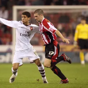 Denilson (Arsenal) Nick Montgomery (Sheff) Denilson (Arsenal) Nick Montgomery (Sheff)