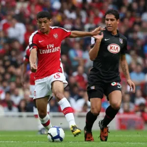 Denilson (Arsenal) Raul Garcia (Atletico) Denilson (Arsenal) Raul Garcia (Atletico)