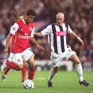 Denilson (Arsenal) Richard Chaplow (WBA)