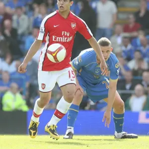 Denilson (Arsenal) Sean Davis (Portsmouth)