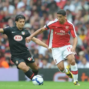Denilson (Arsenal) Sergio Aguero (Athletico Madrid)