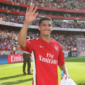 Denilson Celebrates Arsenal's Victory over Stoke City: 4-1 Win at Emirates Stadium, 2009
