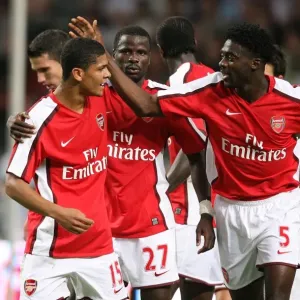 Denilson and Kolo Toure celebrate the 3rd Arsenal goal Denilson and Kolo Toure celebrate the 3rd Arsenal goal