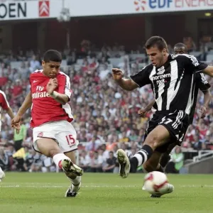 Denilson scores Arsenals 3rd goal past Steven Taylor (Newcastle) Denilson scores Arsenals 3rd goal past Steven Taylor (Newcastle)
