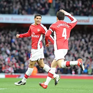Denilson shoots celebrates scoring the 1st Arsenal goal with Cesc Fabregas