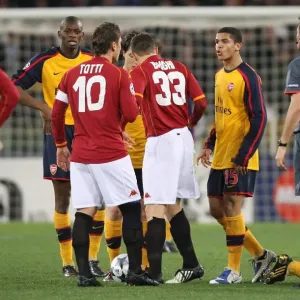 Denilson vs. Totti: Clash in the UEFA Champions League Showdown at Stadio Olympico, Arsenal vs. AS Roma (2009) Denilson vs. Totti: Clash in the UEFA Champions League Showdown at Stadio Olympico, Arsenal vs. AS Roma (2009)