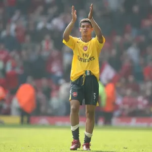 Denilson waves to the Arsenal fans after the match