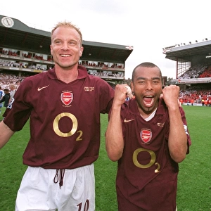 Dennis Bergkamp and Ashley Cole (Arsenal) celebrate at the end of the match