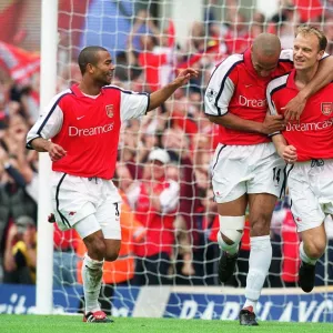 Dennis Bergkamp celebrates scoring the 1st Arsenal goal with Thierry Henry