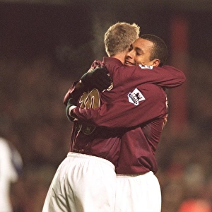 Dennis Bergkamp celebrates scoring Arsenals 1st goal with Gilberto