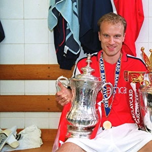 Dennis Bergkamp Celebrating Double Victory: Arsenal's FA Premier League and FA Cup Triumph, 11/5/2002