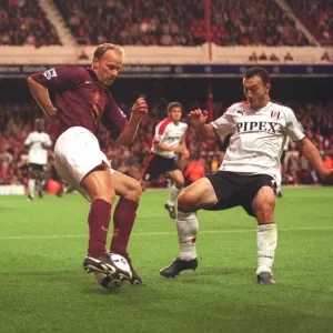 Dennis Bergkamp Scores Against Steed Malbranque: Arsenal's 4-1 Victory Over Fulham in the FA Premier League, August 2005