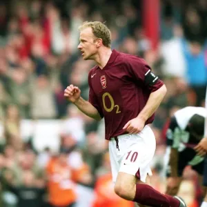 Dennis Bergkamp's Triumphant Goal: Arsenal's Third Strike Against West Bromwich Albion