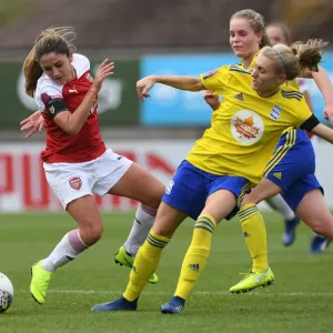 Determination Clash: Van de Donk vs. Folils - A Battle of Will and Skill on the Arsenal Women's Football Pitch Determination Clash: Van de Donk vs. Folils - A Battle of Will and Skill on the Arsenal Women's Football Pitch