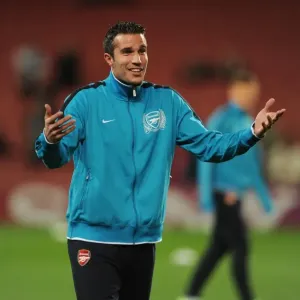 Determined Robin van Persie: Arsenal's Unyielding Battle Against Marseille in the UEFA Champions League, Emirates Stadium (1/11/11) Determined Robin van Persie: Arsenal's Unyielding Battle Against Marseille in the UEFA Champions League, Emirates Stadium (1/11/11)