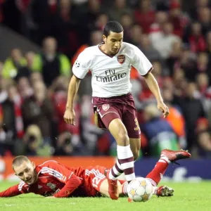 Determined Theo Walcott: Arsenal's Champions League Moment vs. Liverpool - Overcoming Fabio Aurelio to Set Up Adebayor's Goal Determined Theo Walcott: Arsenal's Champions League Moment vs. Liverpool - Overcoming Fabio Aurelio to Set Up Adebayor's Goal