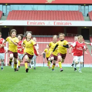 Determined Young Arsenal Player in Action against Aston Villa, 1:2 Loss, Emirates Stadium, 2011 Determined Young Arsenal Player in Action against Aston Villa, 1:2 Loss, Emirates Stadium, 2011