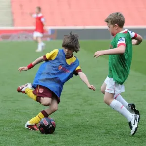 Determined Young Gunner in Arsenal's 1:2 Loss to Aston Villa, Emirates Stadium, 2011 Determined Young Gunner in Arsenal's 1:2 Loss to Aston Villa, Emirates Stadium, 2011