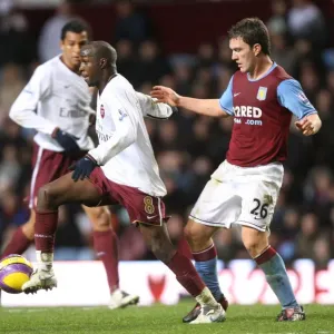 Diarra's Double: Arsenal Edge Past Aston Villa 2-1 in Premier League Clash, December 2007