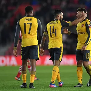 Double Trouble: Walcott and Oxlade-Chamberlain Score Twice in Arsenal's FA Cup Victory over Southampton