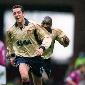 Edu celebrates scoring the 1st Arsenal goal with Sol Campbell