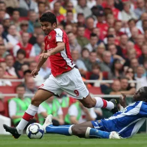 Eduardo (Arsenal) Hendry Thomas (Wigan) Eduardo (Arsenal) Hendry Thomas (Wigan)