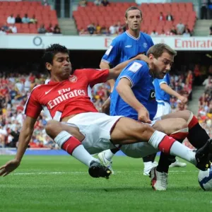 Eduardo (Arsenal) Kevin Thomson (Rangers)