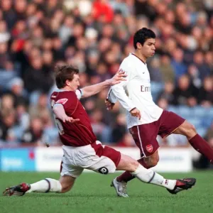 Eduardo (Arsenal) Steven Caldwell (Burnley) Eduardo (Arsenal) Steven Caldwell (Burnley)