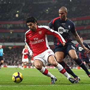 Eduardo (Arsenal) Zat Knight (Bolton). Arsenal 4: 2 Bolton Wanderers. Barclays Premier League