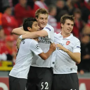 Eduardo, Bendtner, and Ramsey: Celebrating Arsenal's 3rd Goal Against Standard Liege in the UEFA Champions League Eduardo, Bendtner, and Ramsey: Celebrating Arsenal's 3rd Goal Against Standard Liege in the UEFA Champions League