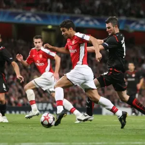 Eduardo breaks past Olympiacos defender Michal Zewlakow Eduardo breaks past Olympiacos defender Michal Zewlakow