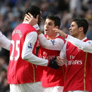 Eduardo celebrares scoring the 2nd Arsenal goal with Cesc Fabregas and Emmanuel Adebayor