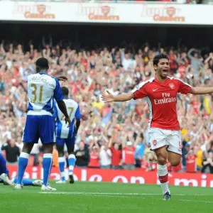 Eduardo celebrates the 3rd Arsenal goal scored by Emmanuel Eboue