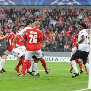 Eduardo celebrates hits the ball past Liege goalkeeper Eduardo celebrates hits the ball past Liege goalkeeper