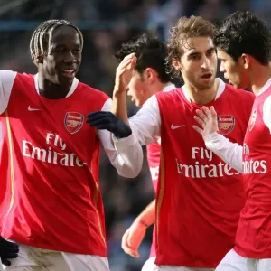 Eduardo celebrates scoring the 2nd Arsenal goal with Mathieu Flamini and Bacary Sagna