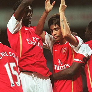 Eduardo celebrates scoring Arsenals 3rd goal with Emmanuel Adebayor
