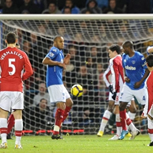 Eduardo shoots past the Portsmouth wall to score the 1st Arsenal goal. Portsmouth 1