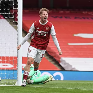 Emile Smith Rowe Scores the Winning Goal: Arsenal's Triumph in Empty Emirates Stadium Against West Bromwich Albion (2020-21)