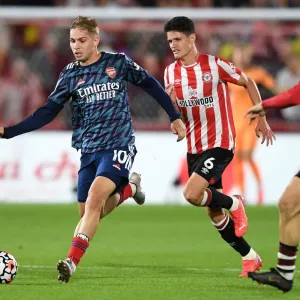 Emile Smith Rowe vs. Christian Norgaard: A Premier League Battle at Brentford Community Stadium (2021-22) Emile Smith Rowe vs. Christian Norgaard: A Premier League Battle at Brentford Community Stadium (2021-22)