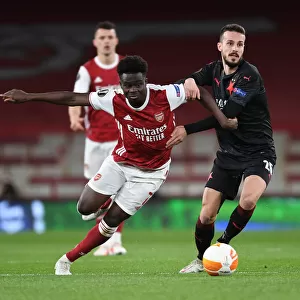 Empty Emirates: Bukayo Saka Leads Arsenal Against Slavia Praha in Europa League Quarterfinal