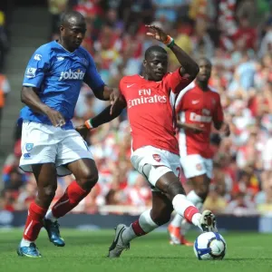 Emmaniuel Eboue (Arsenal) John Utaka (Portsmouth) Emmaniuel Eboue (Arsenal) John Utaka (Portsmouth)