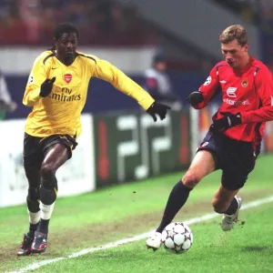 Emmanuel Adebayor (Arsenal) Aleksei Berezutskiy (CSKA) Emmanuel Adebayor (Arsenal) Aleksei Berezutskiy (CSKA)