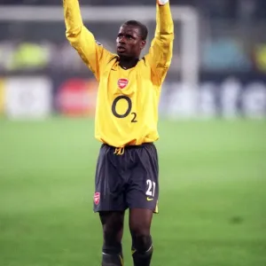 Emmanuel Adebayor (Arsenal) celebrates at the final whistle