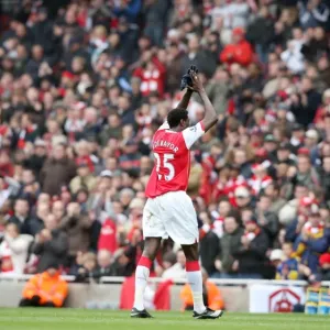 Emmanuel Adebayor (Arsenal) claps the fans as he leaves the pitch