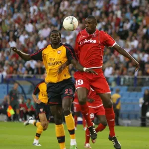 Emmanuel Adebayor (Arsenal) Douglas (FC Twente) Emmanuel Adebayor (Arsenal) Douglas (FC Twente)