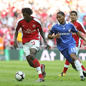 Emmanuel Adebayor (Arsenal) Florent Malouda (Chelsea)
